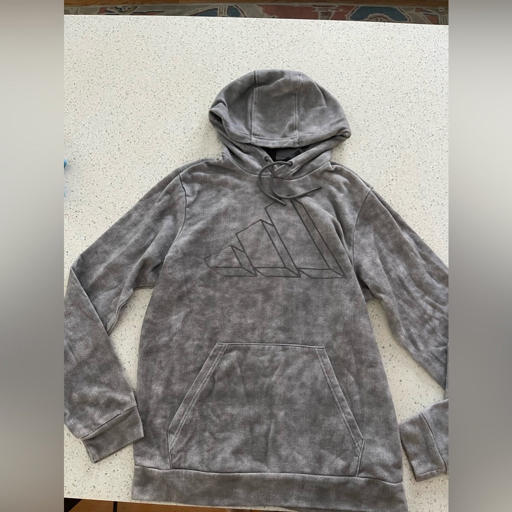 Adidas light weight hoodie, likely never worn. Like new condition. Adult small